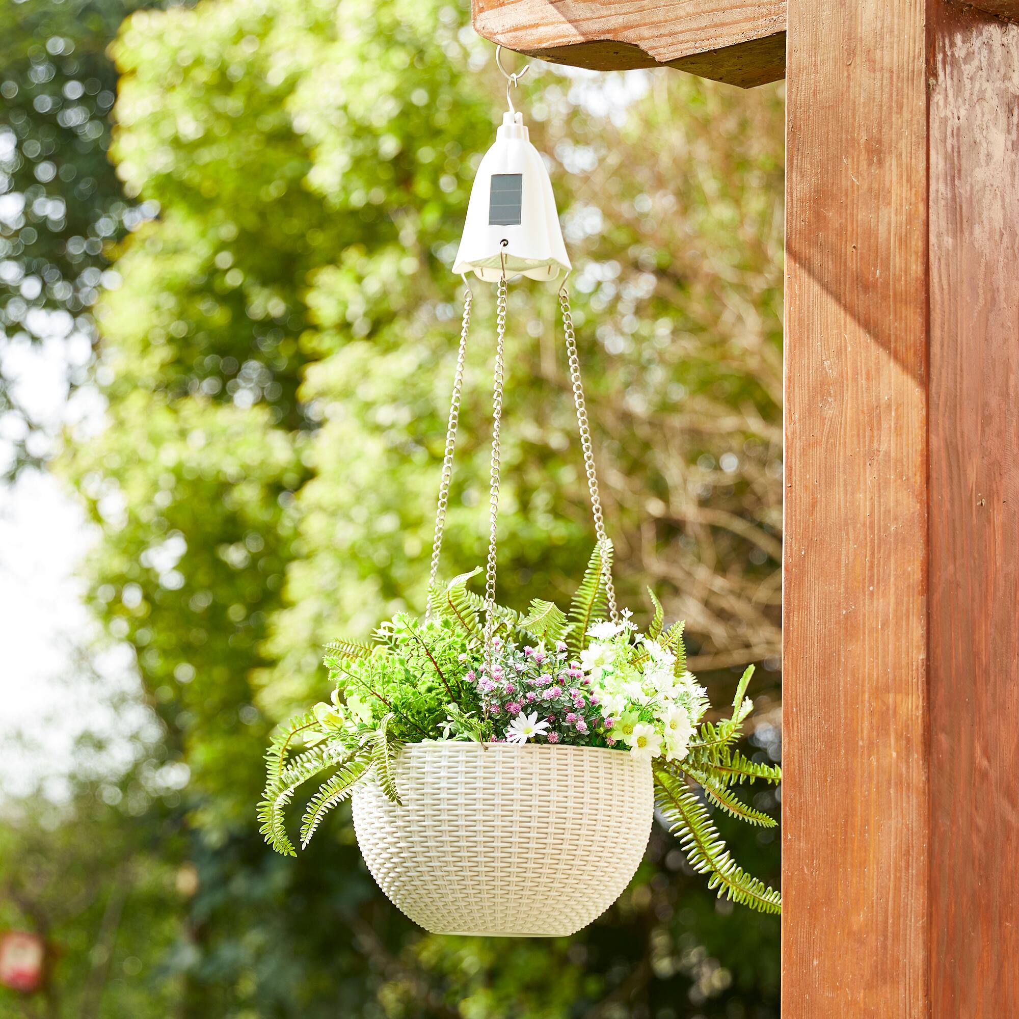 Glitzhome® 30" White Solar Lighted Hanging Plastic Basket Planters, 2ct.